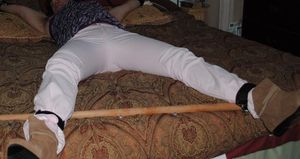 Restrained and helpless