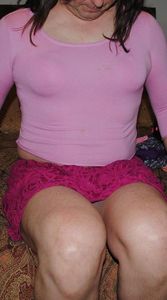 fuzzy pink sweater and mini skirt