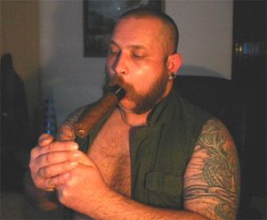 Firing up a large gauge cigar