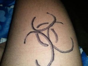 One of the anonymous fucks drew a biohaz symbol on me, and also wrote "FAGGOT" on my chest and "CUMDUMP" on my ass.