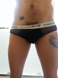 JT cock in mesh briefs