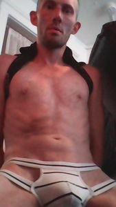 In another guy's undies.