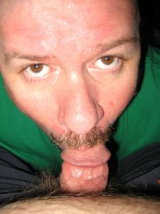 Me sucking my bfs cock.  It looks smaller than it is because he snapped the picture as I was about to stand up so I was pushing his cock upward.