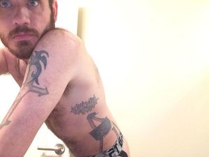 4 tats showing