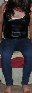 shiny black bodysuit and skinny jeans