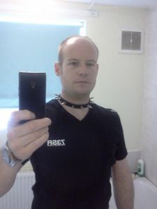 Wearing slutty dog collar...