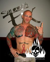 97039d5ff726826d90fa159adfabff65--chest-tattoo-red-ribbon[1].jpg