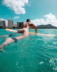 naked surfing in Waikiki
