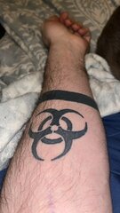 first time i've seen a poz tat on the arm ..