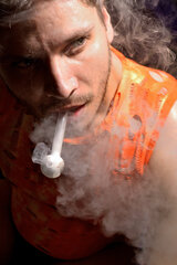 Josh Blowing Clouds.jpg