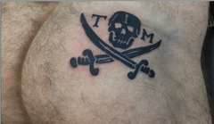 TIM marked man Coles freshly tatted arse.png